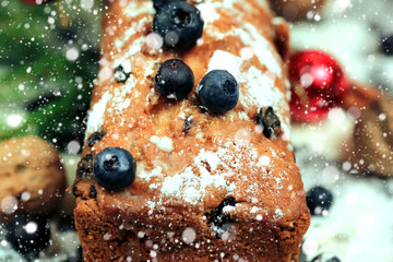 Christmas cake with blueberries selective soft focus