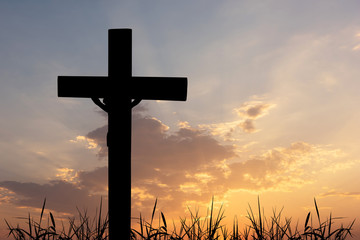 cross silhouette with sunset background