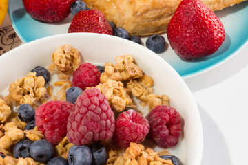 Breakfast with muesli and fruits