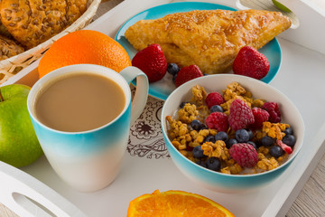 Breakfast with muesli and fruits