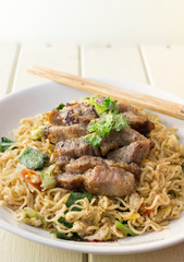 china noodle with garlic pork and vegetable, selective focus point