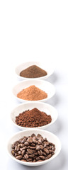 Coffee beans, powdered coffee, chocolate powder and processed tea leaves beverages in white bowl over white background