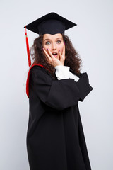 Studio portrait picture from a young graduation woman