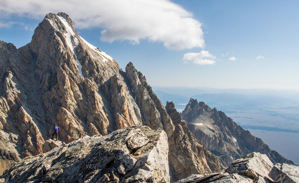 Fototapeta climber atop the tetons