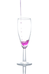 purple cocktail in glass on white background