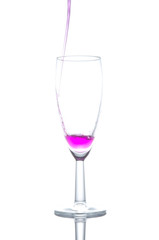 purple cocktail in glass on white background