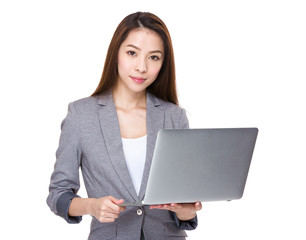 Businesswoman use of the notebook computer