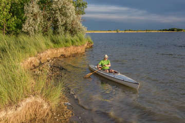 canoe paddling on lake in Colorado
