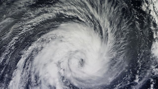 The hurricane over the ocean, satellite view.