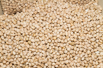 White dry chickpeas on an open air food market bazaar