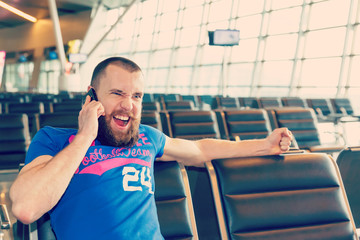 beautiful young man at the airport