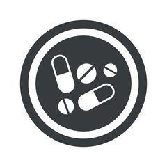 Round black medicine sign