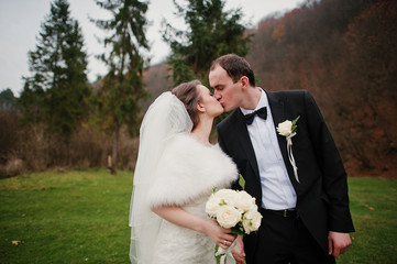wedding couple at the autumn forest