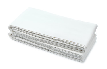 Stack of white folded bedding