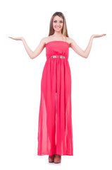 Naklejka premium Beautiful girl in pink long dress isolated on white