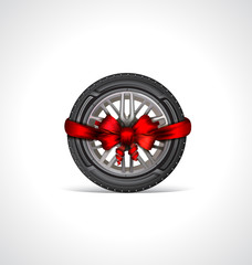 The icon of car tire  with a red bow