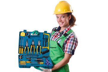 Female workman in green overalls isolated on white