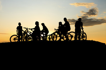 Fototapeta na wymiar Gang Bike and yellow sunset
