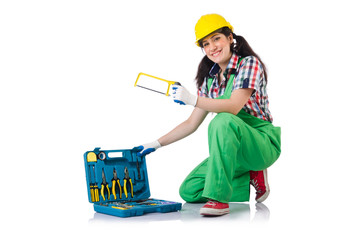 Female workman in green overalls isolated on white