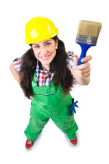 Female workman in green overalls isolated on white