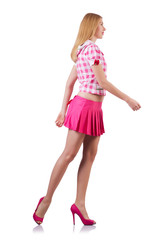 Walking young girl in pink isolated on white