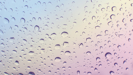 Water drop and droplet on mirror bright