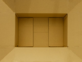 Open up brown paper box