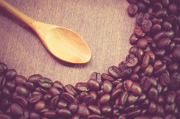 Coffee beans and wooden spoon with filter effect retro vintage s