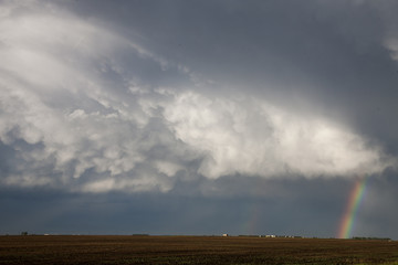 Fototapeta na wymiar Storm Clouds Saskatchewan Rainbow