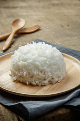 Organic White Rice with wooden spoon & fork - soft focus