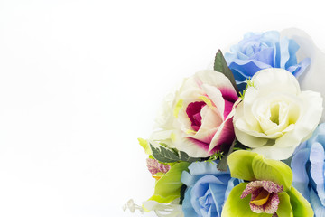 Artificial flowers on white background