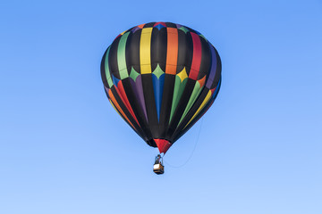 Fototapeta na wymiar Hot air balloon with a sky blue background