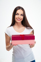 Fototapeta premium Smiling beautiful woman holding gift box