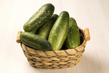 Fresh cucumber on the wooden table