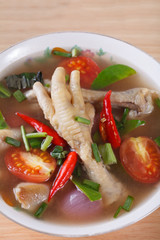sour and spicy chicken feet soup