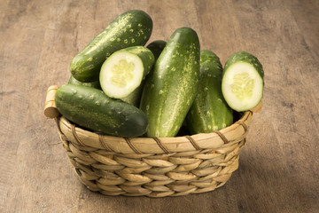 Fresh cucumber on the wooden table