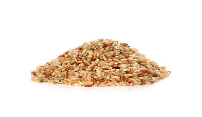 Pile of whole brown rice isolated on white background
