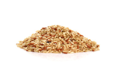 Pile of whole brown rice isolated on white background