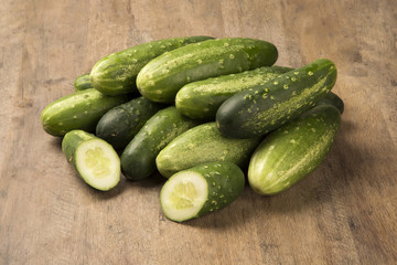 Fresh cucumber on the wooden table
