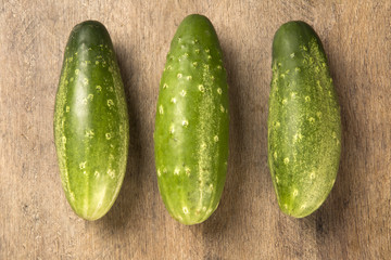 Fresh cucumber on the wooden table
