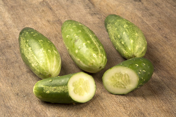Fresh cucumber on the wooden table