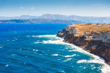 Waves on the sea coast of Santorini island, Greece