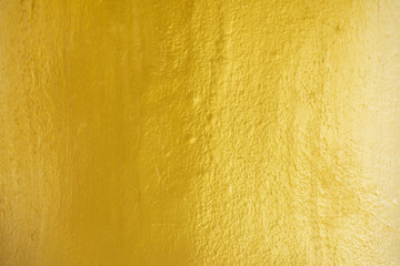 Gold color of concrete background and texture.
