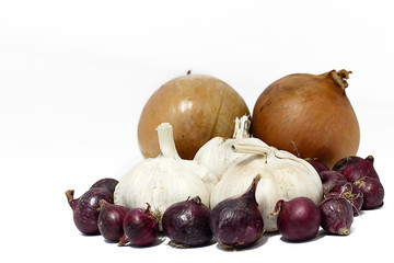Garlic, red and bulb onion isolated on white background.