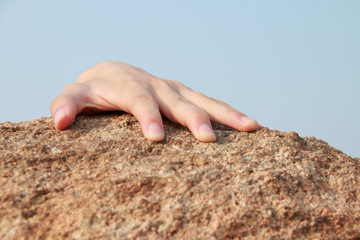 Rock climbing, close-up finger