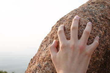 Rock climbing, close-up finger