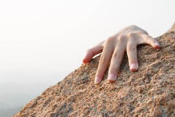 Rock climbing, close-up finger
