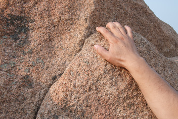 Rock climbing, close-up finger