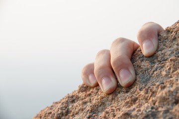 Rock climbing, close-up finger