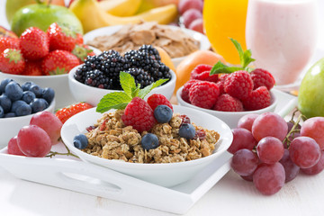 Delicious and healthy breakfast with fruits, berries and cereal